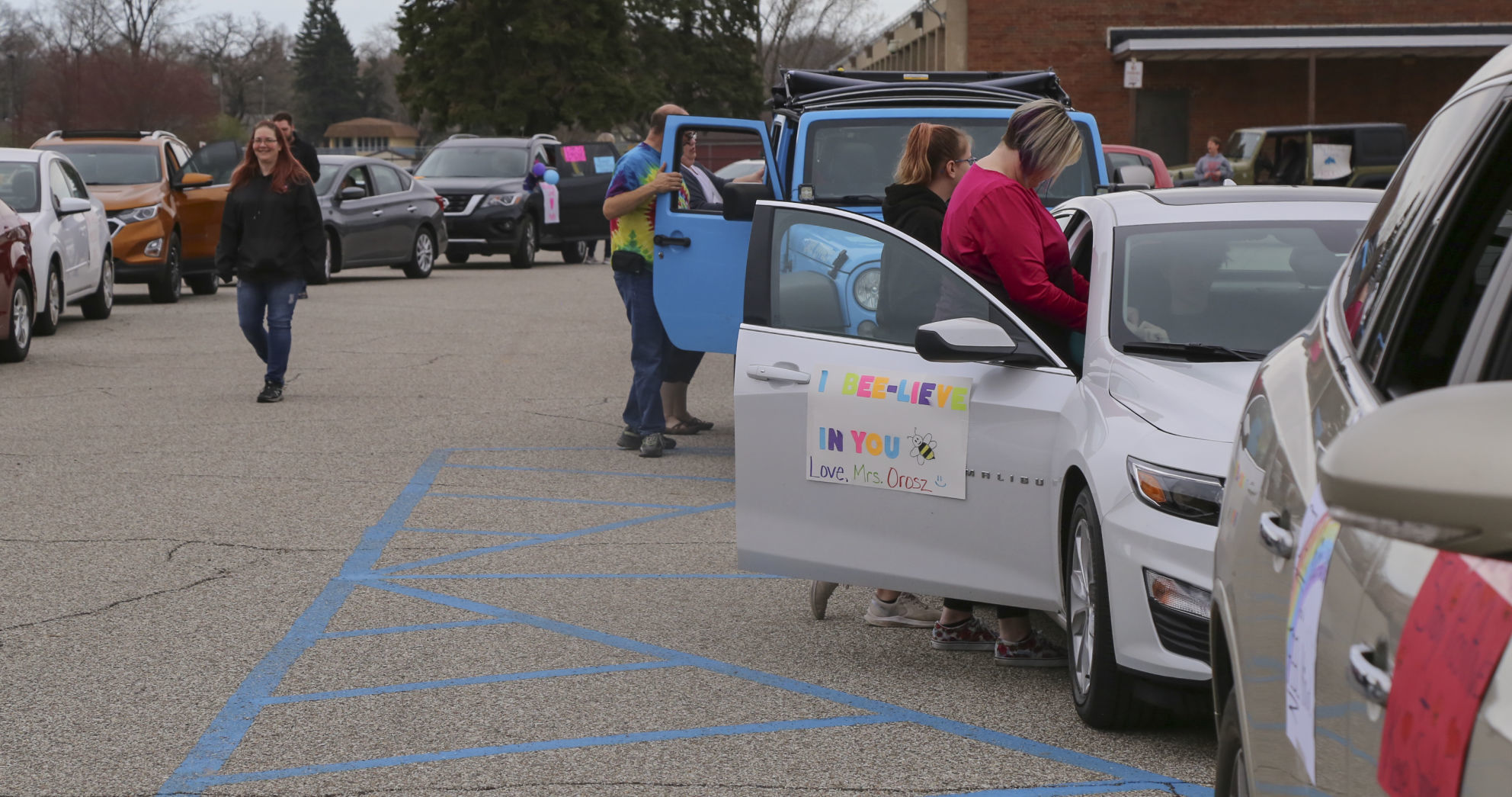 Aylesworth Elementary School in Portage teachers and staff parade through the neighborhoods in their district